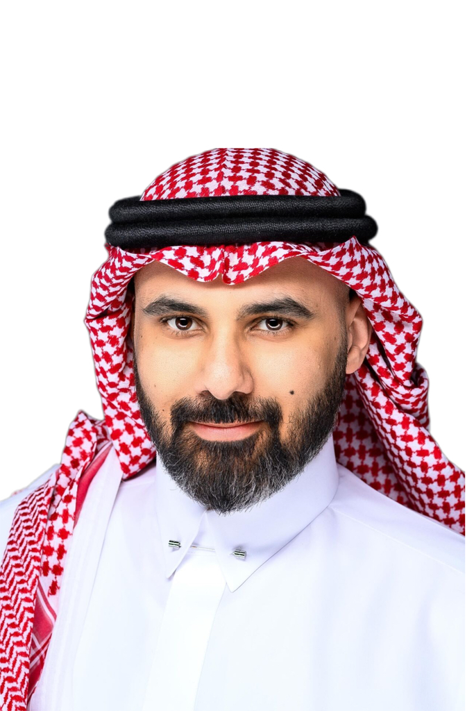 Akram Jaml-Allail wearing a white thobe and red-and-white shemagh